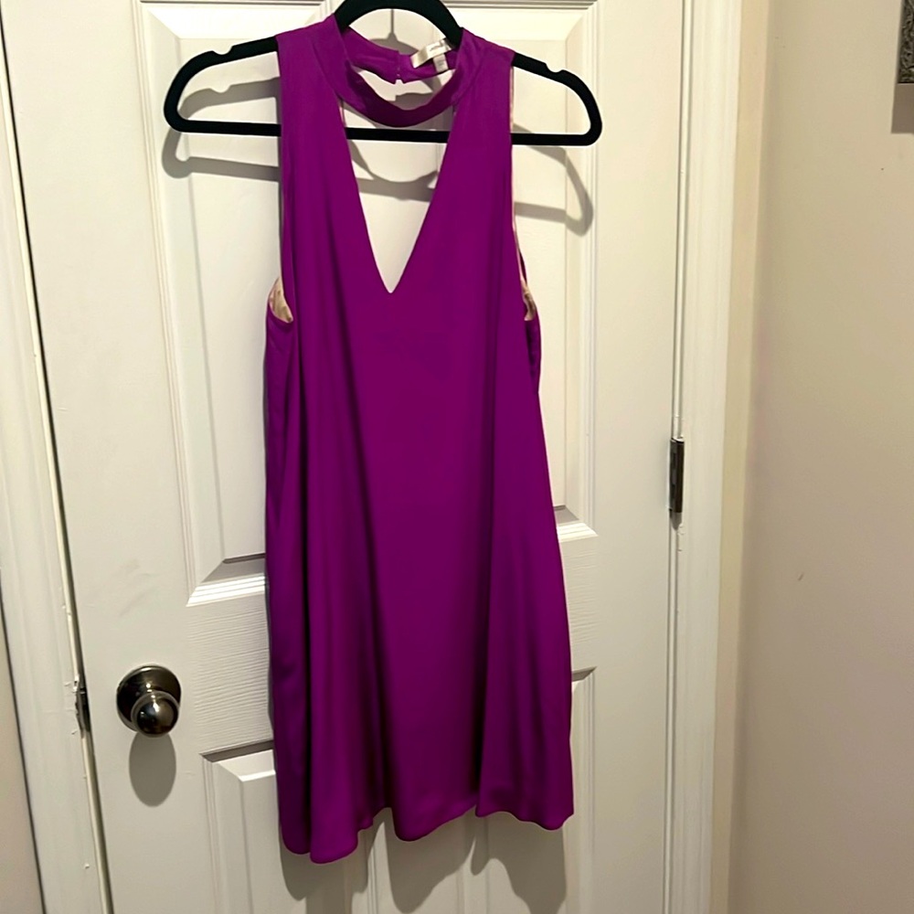 Gorgeous high necked purple size small dress with pockets